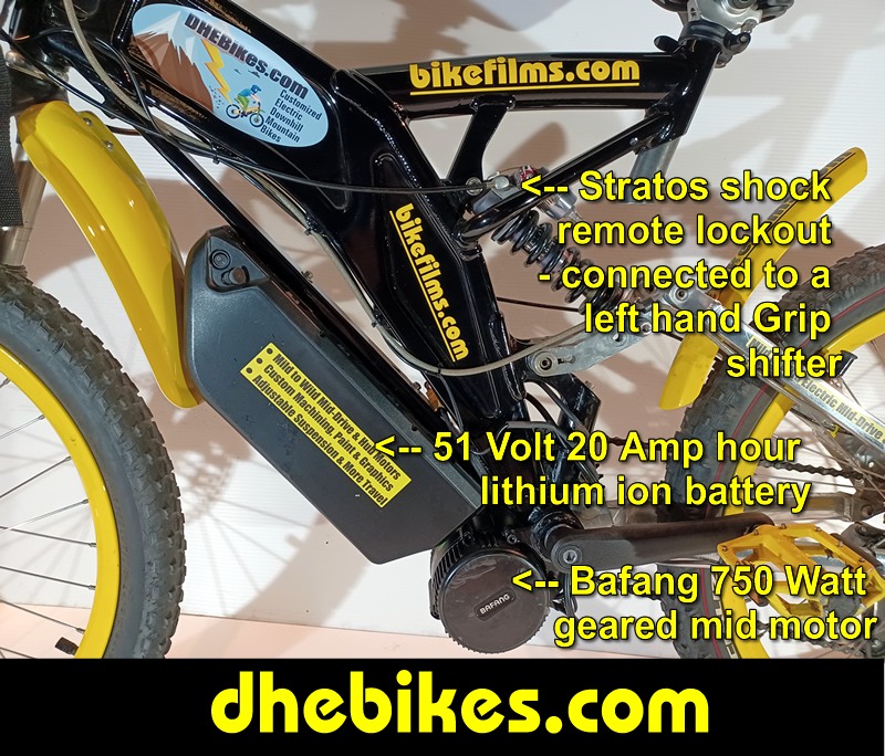 Custom made to order Womens electric downhill mountain bike by Pinnacle Innovations side view showing the Stratos rear air/ oil/coil shock with remote lockout and the Bafang 750 Watt mid mount electric motor kit with 20 Amp hour lithium ion 51 Volt battery.
