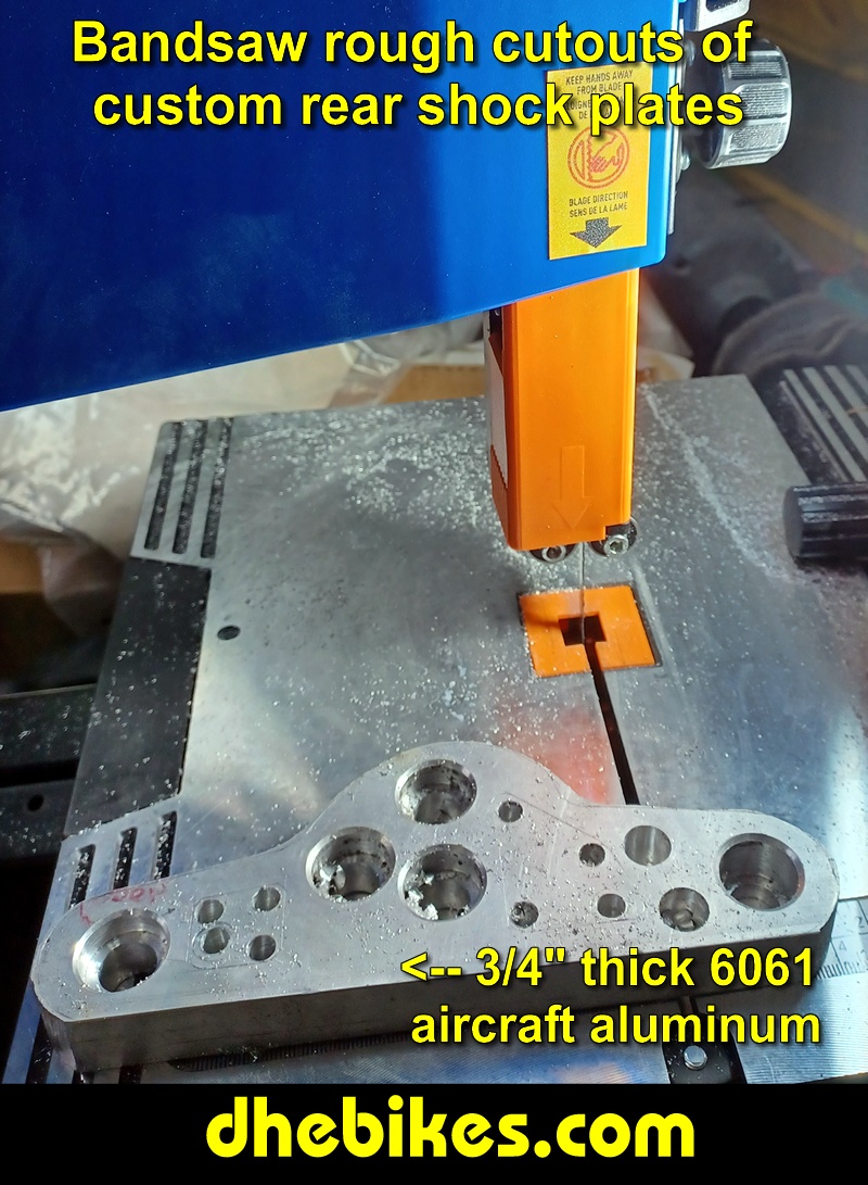 Photos showing the bandsaw cutting of the 3/4 inch thick 6061 aluminum rear suspension plates that will almost double the amount of travel.