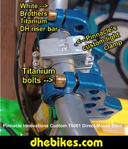 Pinnacle Innovations picture showing the custom made dual clamp high rise shorty stem and custom light mount made from 6061 aircraft aluminum for a Norco custom electric downhill bike.
